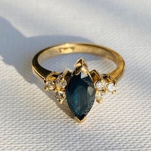 One-carat Marquise Sapphire Ring with 6 Small Diamonds